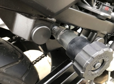 BRUUDT Rear Foot Rest Blanking Plug Kit for the Suzuki V-Strom 650 2017 and later models.